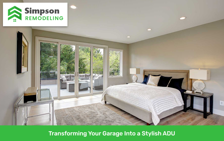 converted garage showing a modern bedroom with a cozy seating area outside.